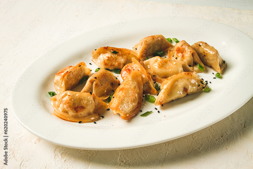 japanese fried gyoza dumplings, with pork, sesame seeds, green onions, japanese fried gyoza dumplings, with pork, sesame seeds, green onions,