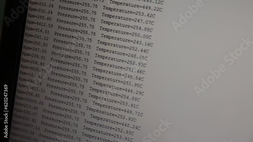 digital screen monitor reading monitoring rpm pressure and temperature of an industrial machine 