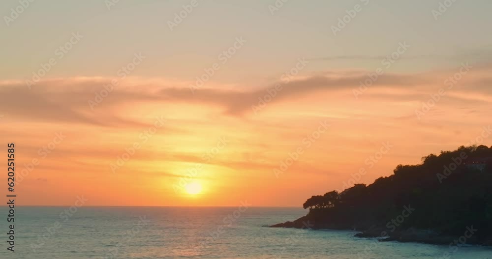 .aerial view beautiful yellow sun in bright sky at horizon above the sea.. .Clouds obscured the yellow sun in the evening background for creative nature .and travel concept. sky texture. .aerial view beautiful yellow sun in bright sky at horizon above the sea.. .Clouds obscured the yellow sun in the evening background for creative nature .and travel concept. sky texture.