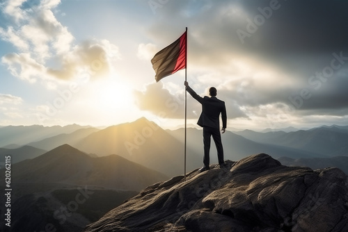 Triumphant Businessman Conquering the Mountain Peak with Winner Flag. Generative AI © Siriroj