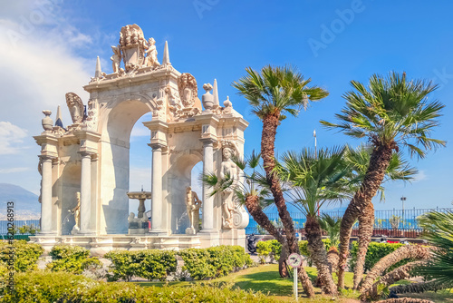 View of the Fountain of the Giant at the seaside of Naples, Italy. The fountain was designed by Michelangelo Naccherino and Pietro Bernini in the 17th century. photo