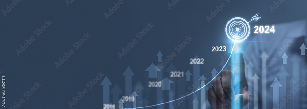 2024 Businessman analyzing company financial balance sheet working with digital virtual graphics Businessman calculating financial data for long term investment growth goals - obrazy, fototapety, plakaty 
