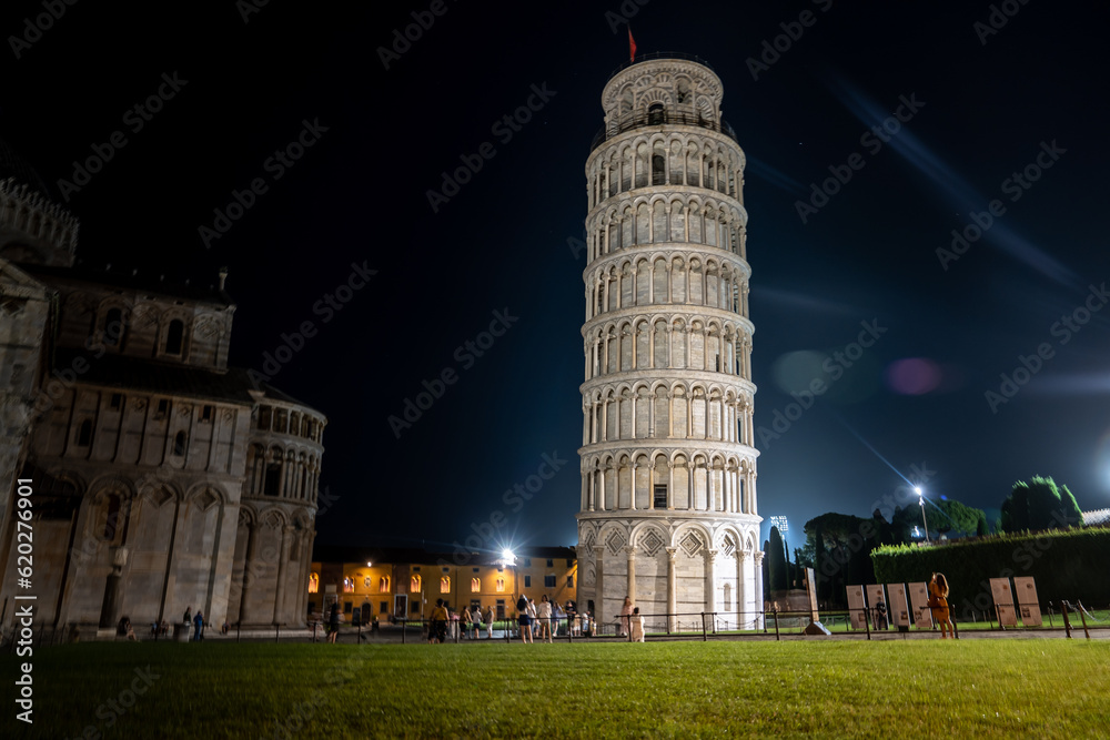 Leaning Tower of Pisa, Piazza dei Miracoli in Pisa, Tuscany, Italy and Pisa Cathedral, twilight night view