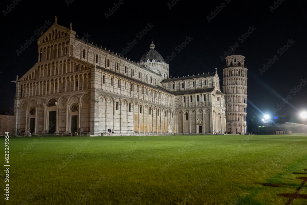 Leaning Tower of Pisa, Piazza dei Miracoli in Pisa, Tuscany, Italy and Pisa Cathedral, twilight night view