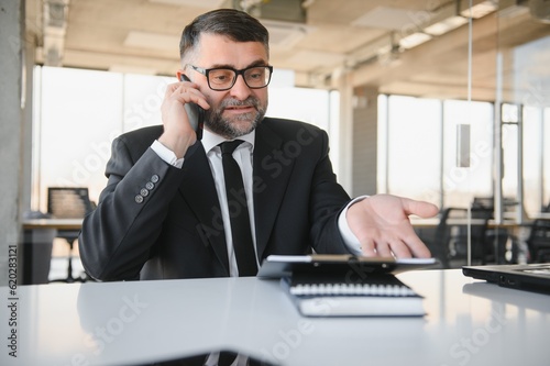 Corporate mad people yell authority tell speak with staff people person concept. Side profile view portrait of disappointed tired busy sad upset agent financier shouting on receiver in his hand