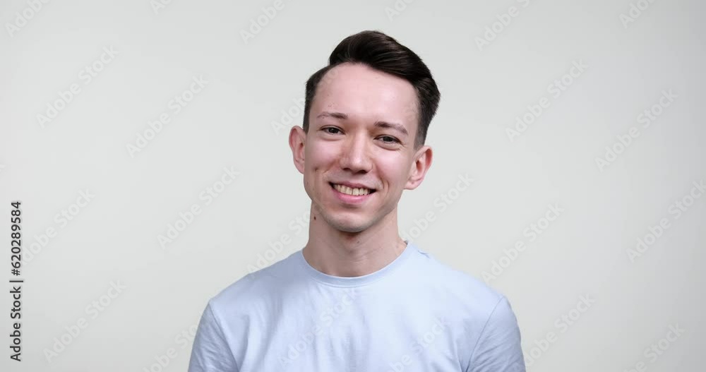 Caucasian man as he stands against a pristine white background, his eyes gleaming with joy and his smile radiating pure positivity. With an effortless allure, he locks eyes with the camera. Caucasian man as he stands against a pristine white background, his eyes gleaming with joy and his smile radiating pure positivity. With an effortless allure, he locks eyes with the camera.