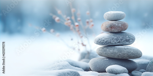 stack of pebbles or stones on winter outdoor background. Winter yoga