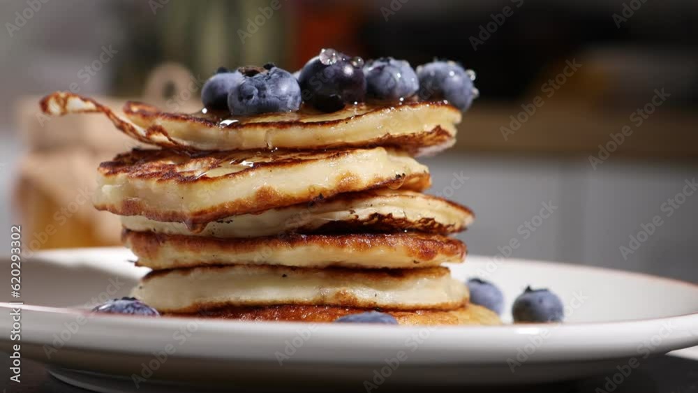 rotation of pancakes with berrys and honey rotation of pancakes with berrys and honey