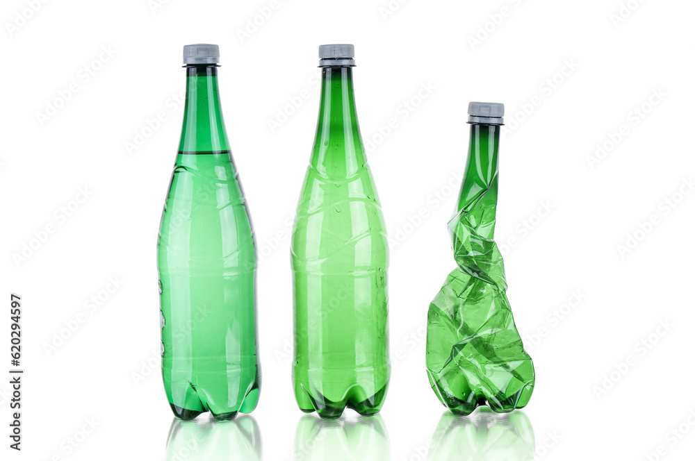 Plastic bottles soda water and wrinkled bottle on white background Plastic bottles soda water and wrinkled bottle on white background