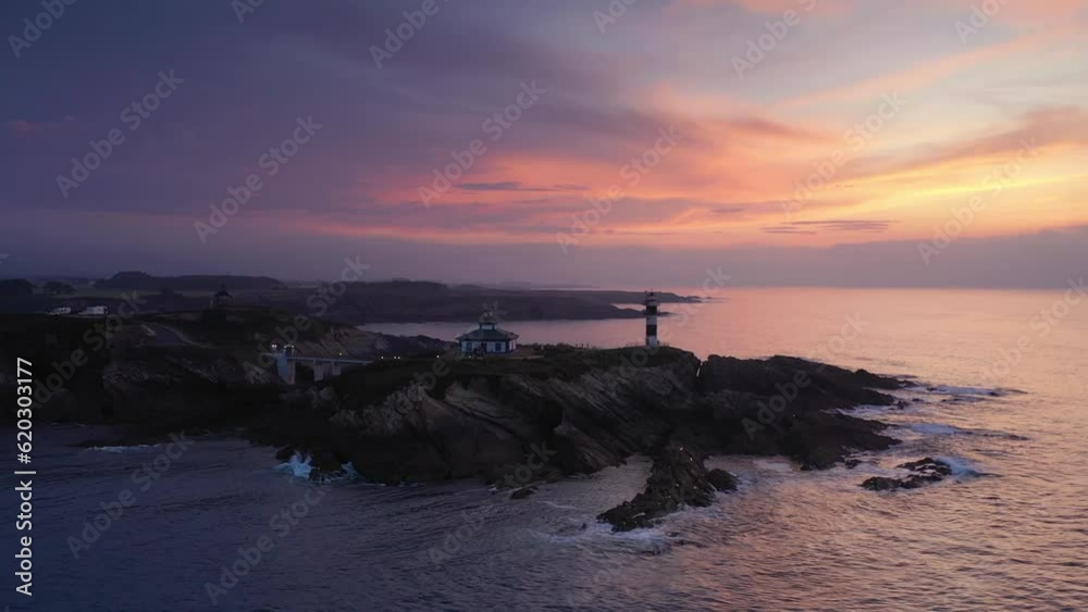 Beautiful Sunset at Lighthouse Faro De Isla Pancha, Spain Beautiful Sunset at Lighthouse Faro De Isla Pancha, Spain
