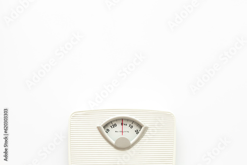 White floor weight scales top view. Body weight control and slimming concept