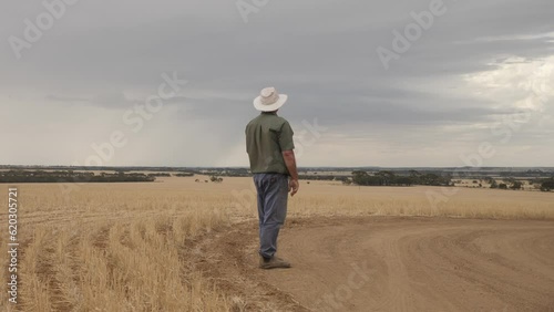 Farmer waiting for rain rural scenes. 4K farming scenes.