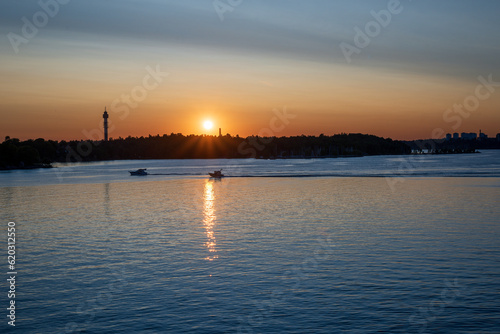 Scenic view of lake against sky at sunset  Nacka  Stockholm Sweden