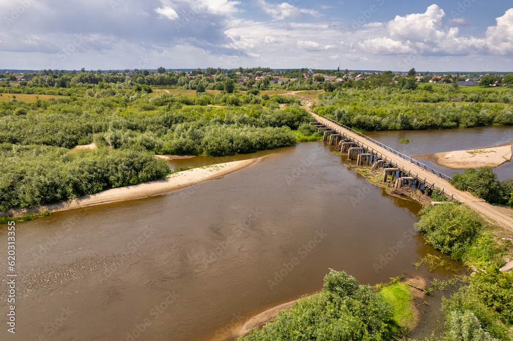 Aerial drone view over Sluch river in Rivne region, Ukraine.