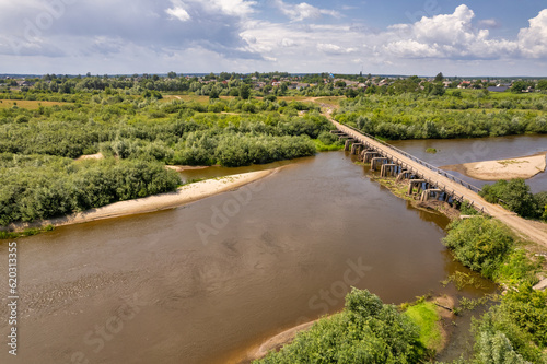 Aerial drone view over Sluch river in Rivne region, Ukraine.