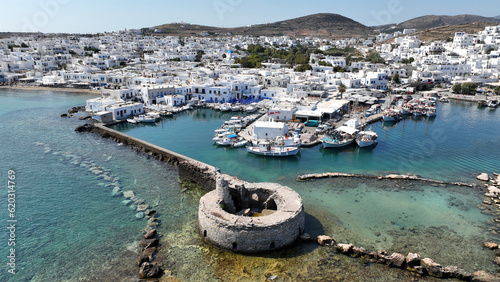 Aerial drone photo of picturesque small seaside village of Naoussa with traditional Cycladic character, Paros island, Cyclades, Greece