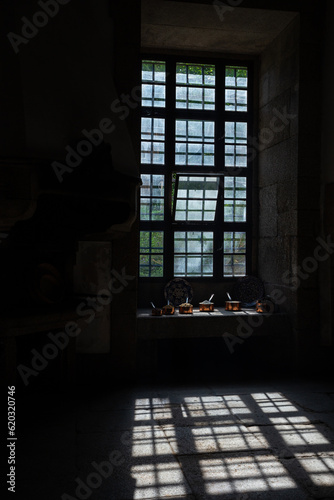 Ingredients to make Conventual Sweets, illuminated by sunlight coming through an ancient Monastery window, Portugal.