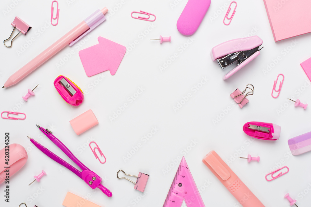 Pink school stationery on color backgroung, top view Pink school stationery on color backgroung, top view