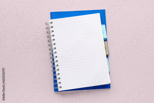 Blank open notebook on light background