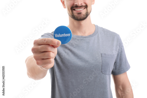 Male volunteer with badge o...