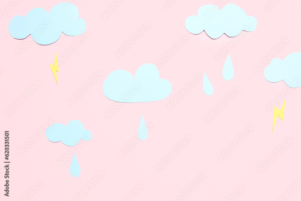 Paper clouds with rain drops and lightnings on pink background. Weather forecast concept Paper clouds with rain drops and lightnings on pink background. Weather forecast concept