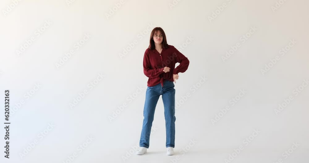 Caucasian teenage girl on white backdrop, she unleashes her inner joy through dance, swaying to the rhythm with enthusiasm. Her effortless movements create an atmosphere of pure happiness. Caucasian teenage girl on white backdrop, she unleashes her inner joy through dance, swaying to the rhythm with enthusiasm. Her effortless movements create an atmosphere of pure happiness.