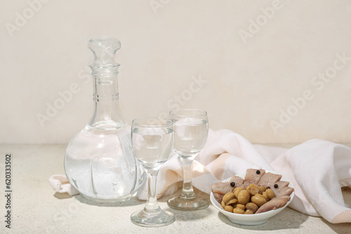 Clear glass decanter and tw...