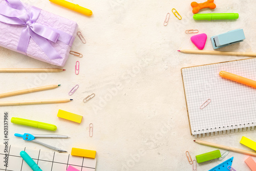 Gift box with different stationery on white background