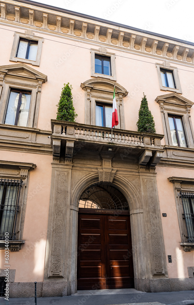 Milan, Italy - June 11, 2023: Façade of Orsini Palace, neoclassic-style palace built in the 17th century, now owned by Giorgio Armani Spa, in via Borgonuovo, in Milan, region of Lombardy, Italy.