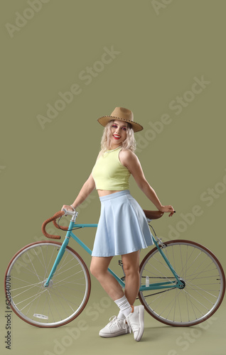 Young woman in summer hat w...