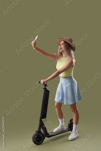 Young woman in summer hat w...