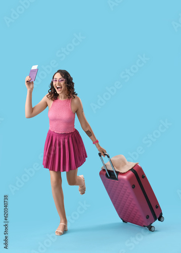 Young woman with passport a...