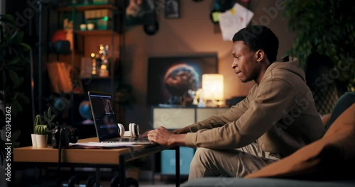 American dedicated student pursuing higher education enrolled in online degree program taking remote classes using computer to engage in virtual lectures, research, and assignments.