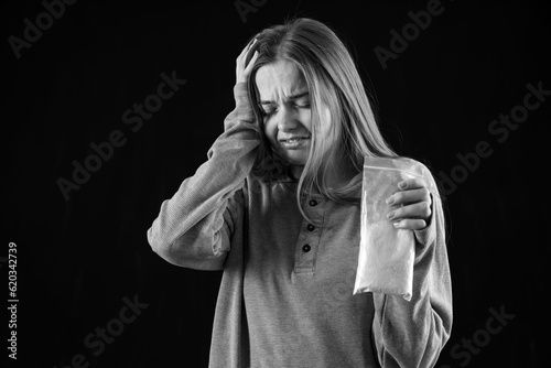 Young female junkie with dr...