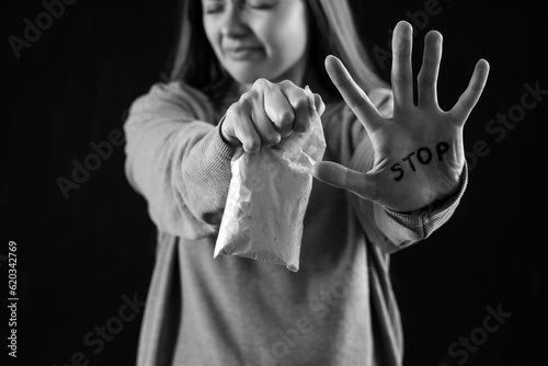 Young female junkie with dr...