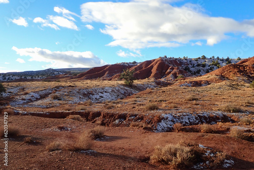 Colorful sandstone rock formations with a dusting of snow at Capitol Reef National Park, Utah, USA