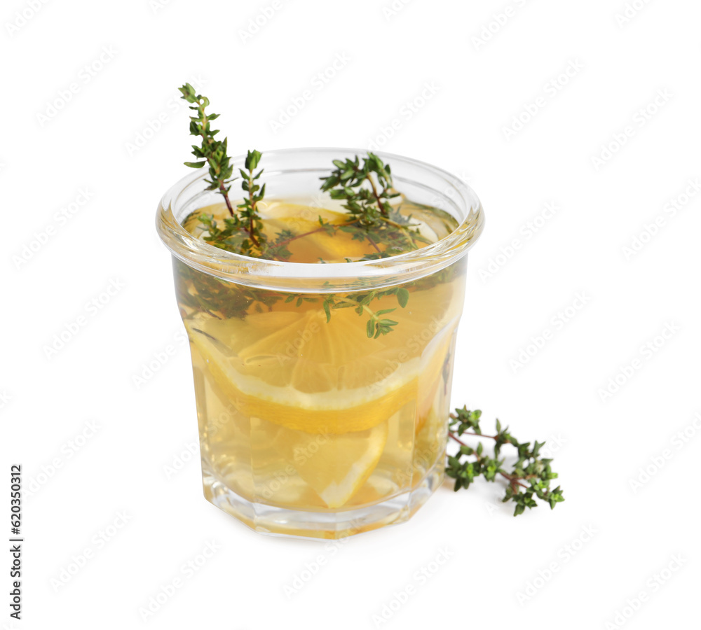 Aromatic herbal tea with thyme and lemon isolated on white Aromatic herbal tea with thyme and lemon isolated on white