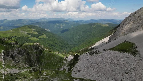 Beautiful epic rocks with scatterings of stones and coniferous trees. Mountains Komovi. Montenegro. Aerial view. photo