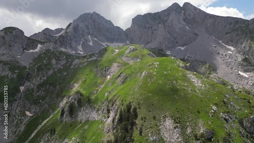 Beautiful epic rocks with scatterings of stones and coniferous trees. Mountains Komovi. Montenegro. Aerial view. photo