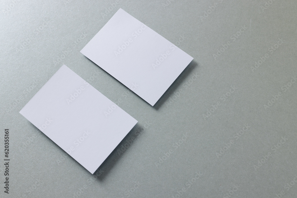 White business cards with copy space on grey background