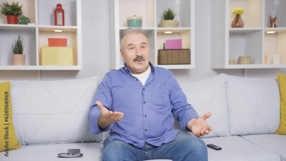 The old man watching TV says wow. The old man watching TV says wow.