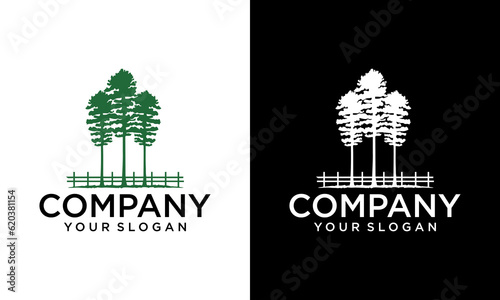 vintage big tree with wooden fence ranch logo