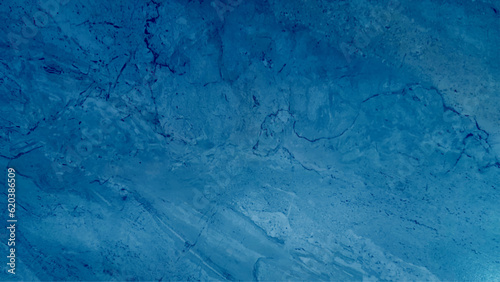 Blue with silver creative abstract hand painted background, marble texture, abstract ocean, acrylic painting on canvas. Modern art. Contemporary art.