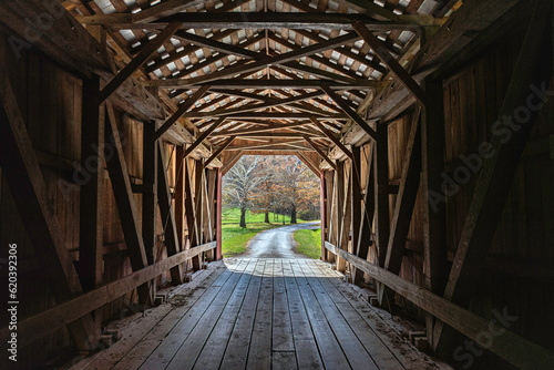 Looking through a wooden covered bridge