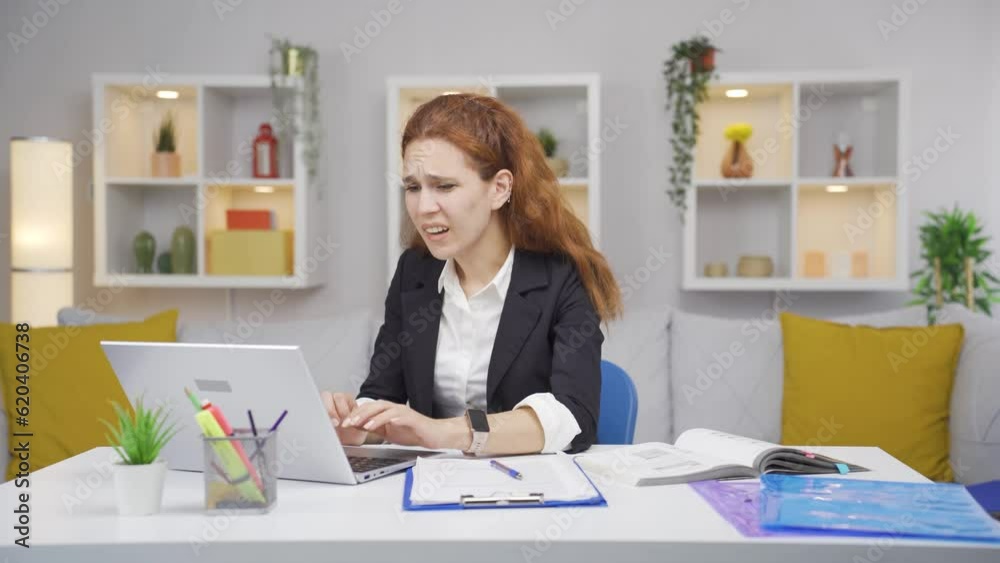 Home office worker woman see her failure on laptop.
