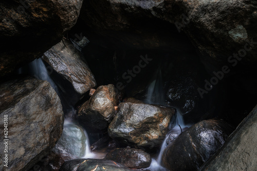 a cave in the waterfall