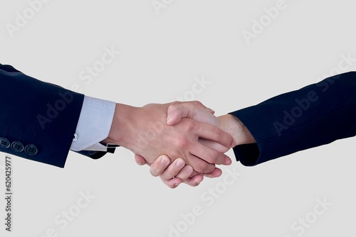 握手するビジネスシーンの男女