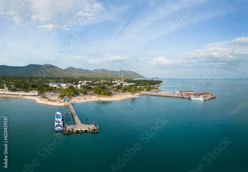 Ko Pha Ngan, Thailand: Aerial panorama of the Thong Sala ferry harbor and town in the Ko Phangan island in the gulf of Thailand. photo