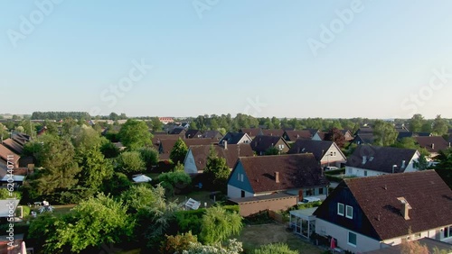 Wallpaper Mural Ascending aerial shot from lush garden showing housing area in Staffanstorp, Sweden.  Torontodigital.ca