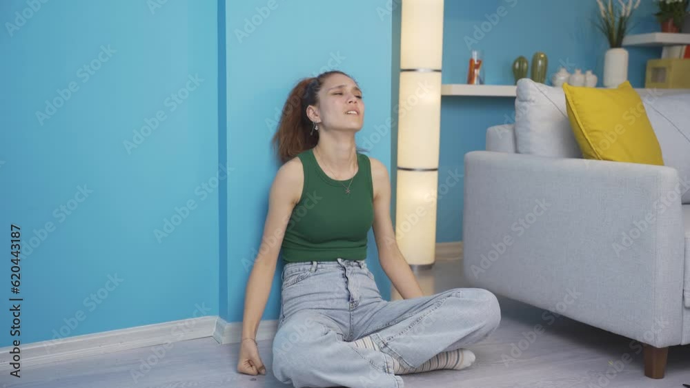 The woman who punches the wall in anger. The woman who punches the wall in anger.